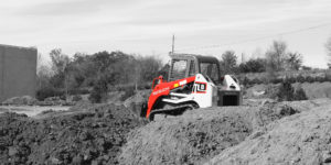 TL8 working in dirt field