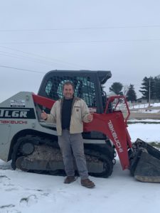 Thomas Jackson Standing In Front of New TL6R