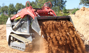 TL12R2 Dumping a Load of Dirt