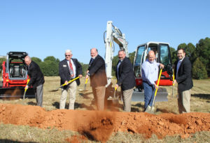 Six Members of Takeuchi's Team Breaking Ground On New Training Center Using Shovels