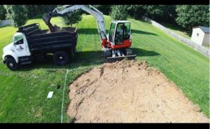 TB260 Hydraulic Excavator Putting Dirt in a Truck