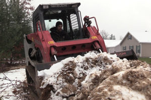 Takeuchi Track Loader Moving Snow
