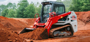 TL11R3 Moving dirt with bucket